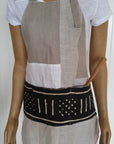 on mannequin - Patchwork linen and cotton apron. Fully lined with front mudcloth pocket.