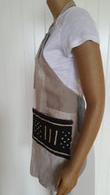 Load image into Gallery viewer, side view - Patchwork linen and cotton apron. Fully lined with front mudcloth pocket.