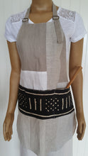 Load image into Gallery viewer, on mannequin - Patchwork linen and cotton apron. Fully lined with front mudcloth pocket. 
