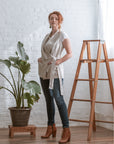 cream vest showing tie details