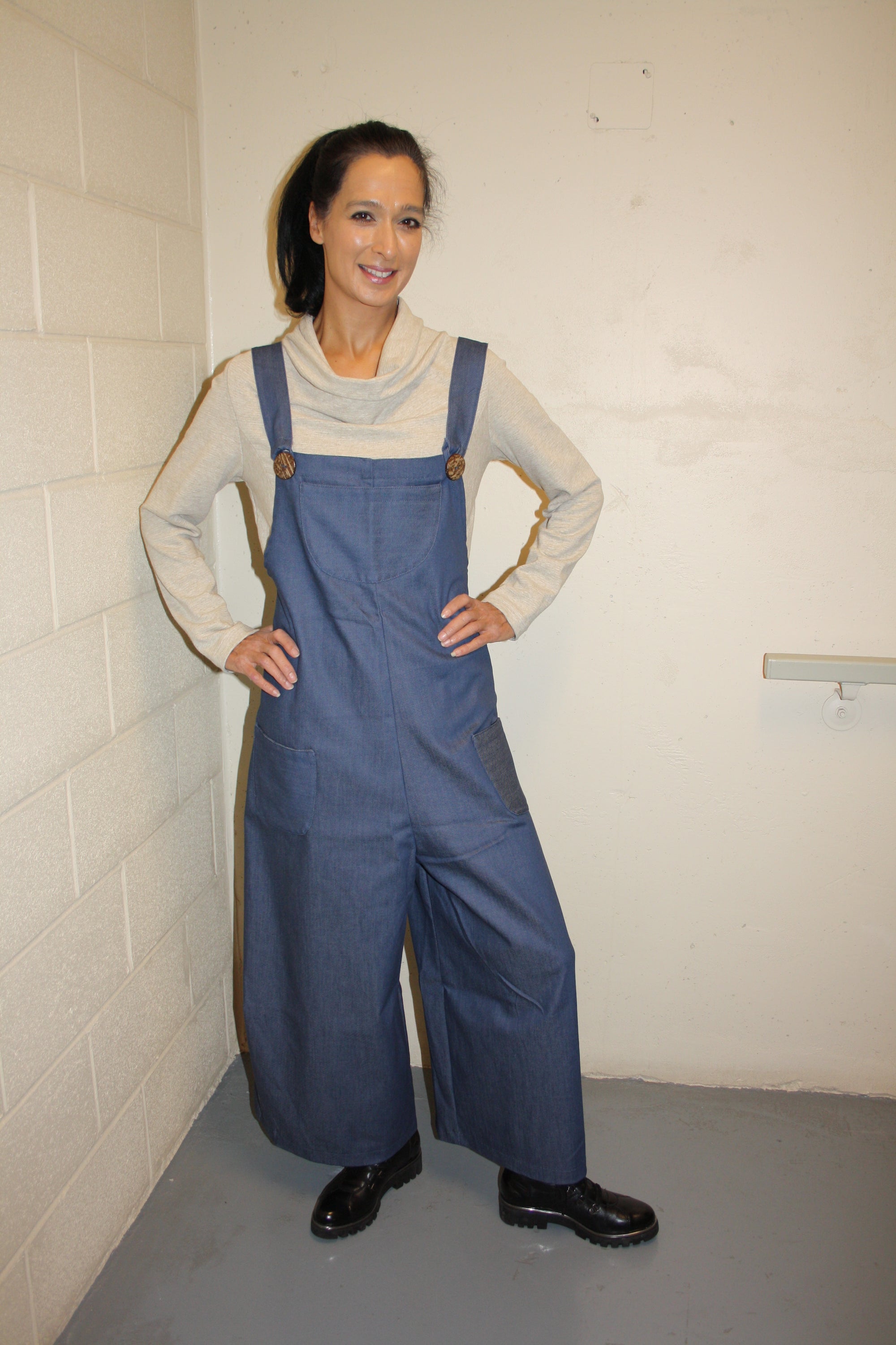 blue denim jumper with button closure