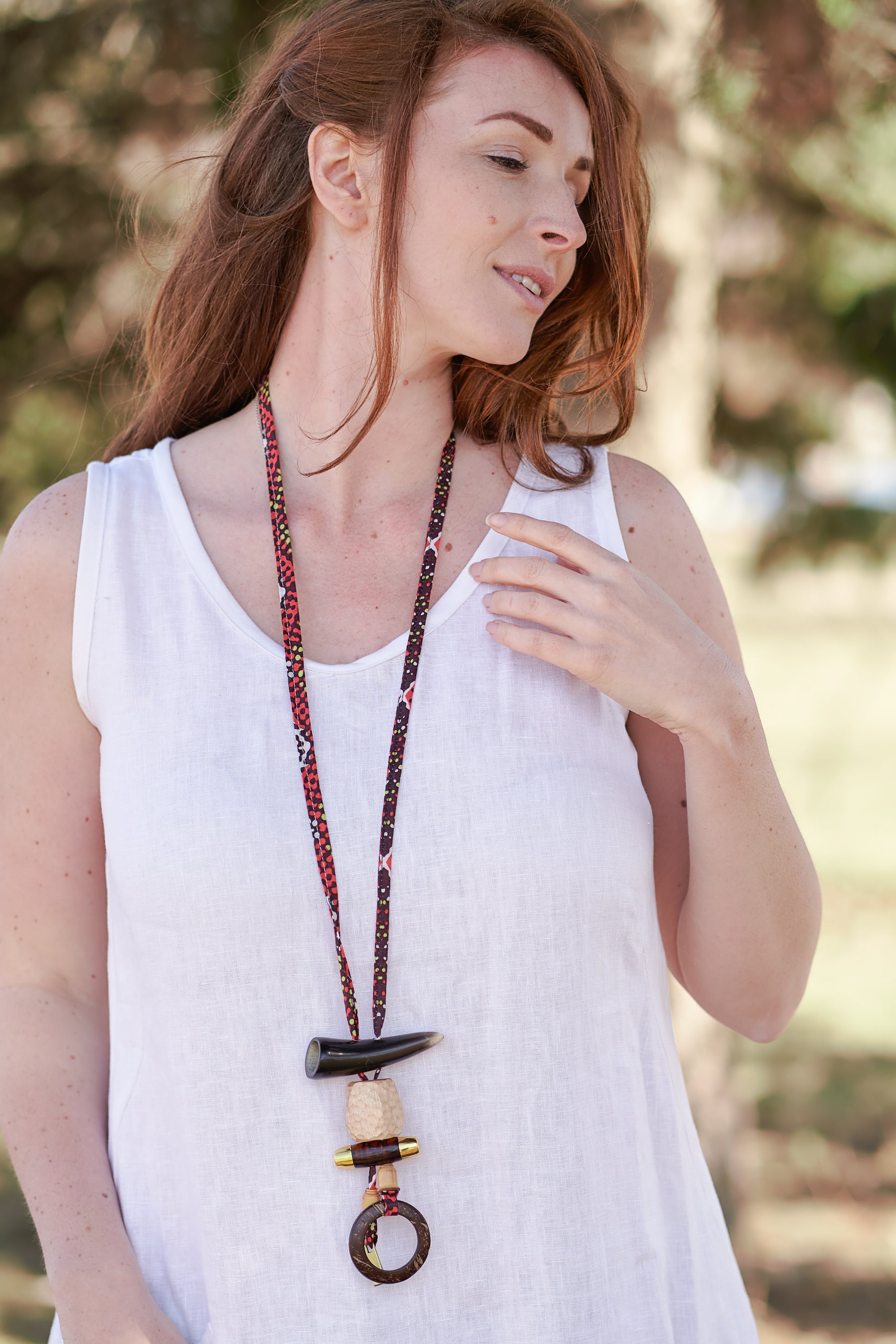 wearable art necklace in rust colour tones