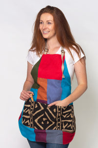 on model - Patchwork linen and cotton apron. Fully lined with front mudcloth pocket. 