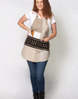 on model - Patchwork linen and cotton apron. Fully lined with front mudcloth pocket. 