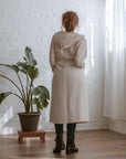 creme coloured hooded robe/coat back view
