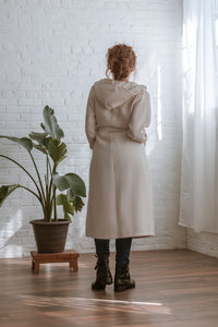 creme coloured hooded robe/coat back view