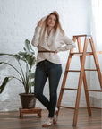 Creme circle jacket with belt and hood up